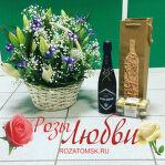 Корзина из 15 ирисов и 5 лилий. Шампанское и конфеты.